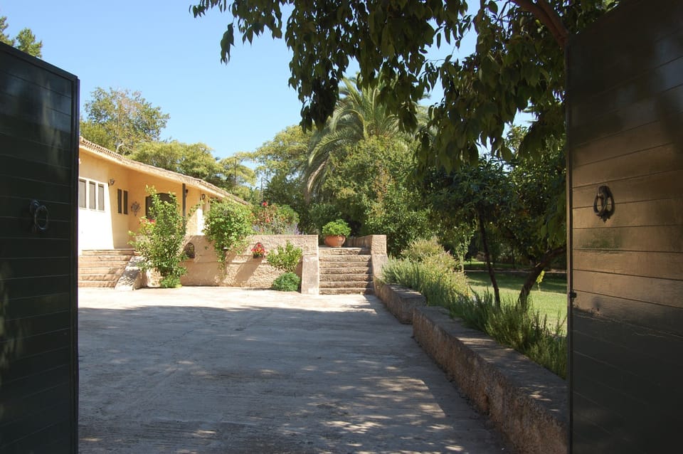 Courtyard front entrance, with private parking