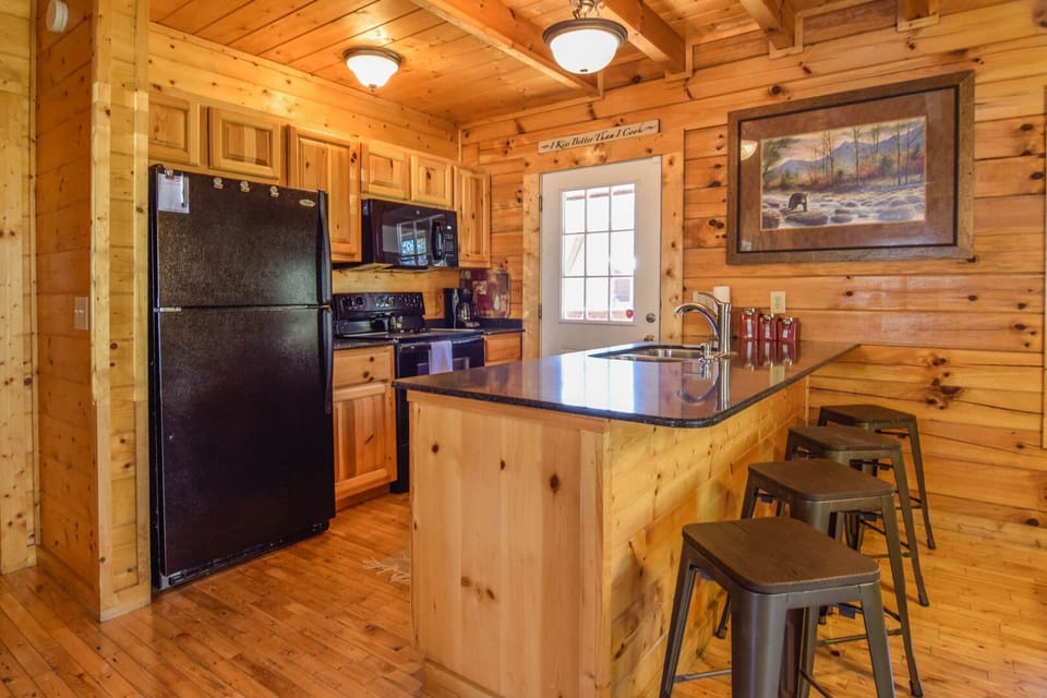 Kitchen with 4 counter top seats