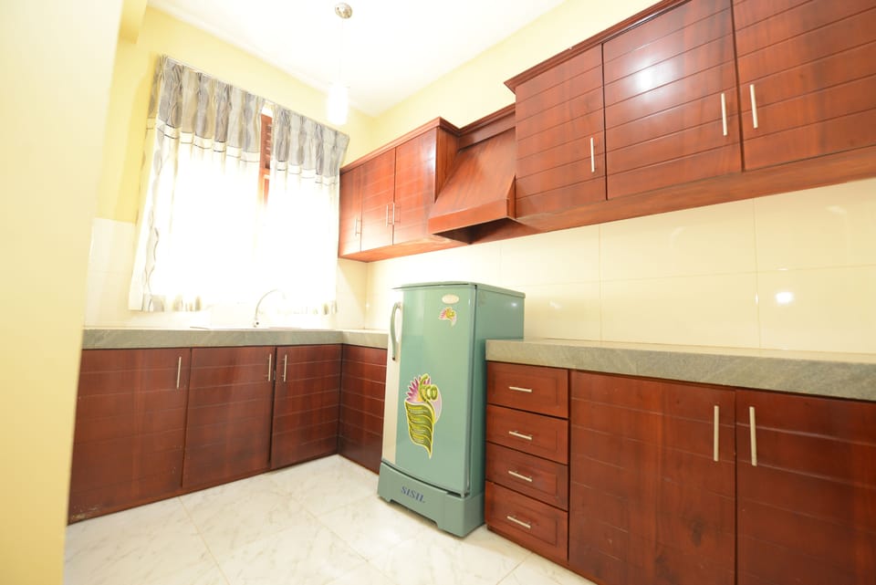 Family Apartment, Multiple Beds, Non Smoking | Private kitchen | Fridge, rice cooker, cookware/dishes/utensils