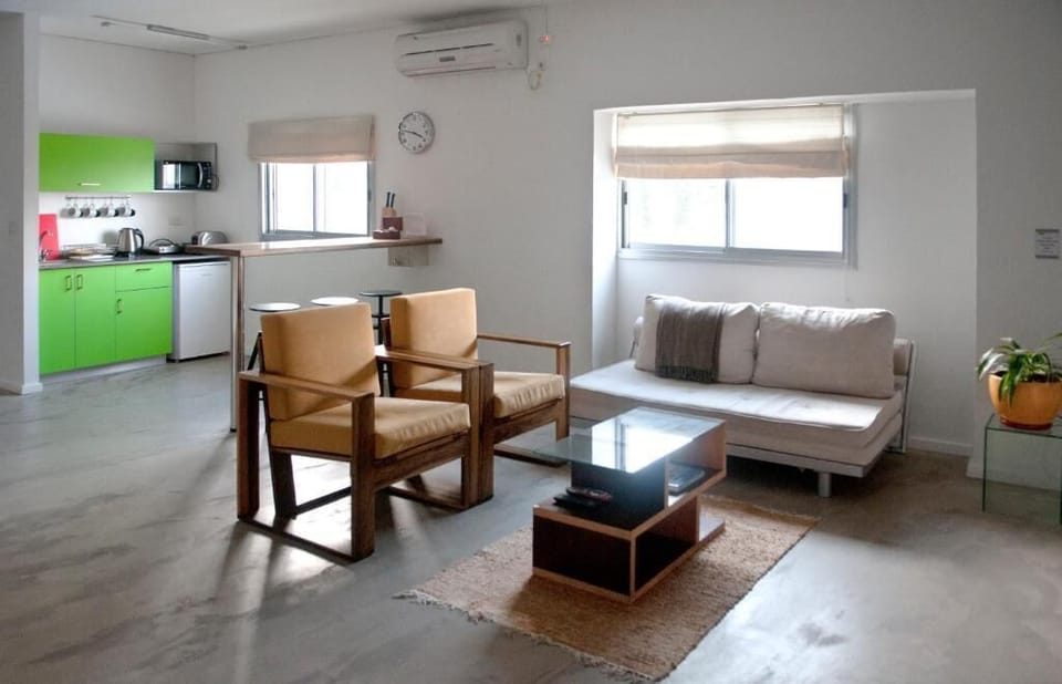 Premium Apartment | Living area | 32-inch flat-screen TV with cable channels, TV
