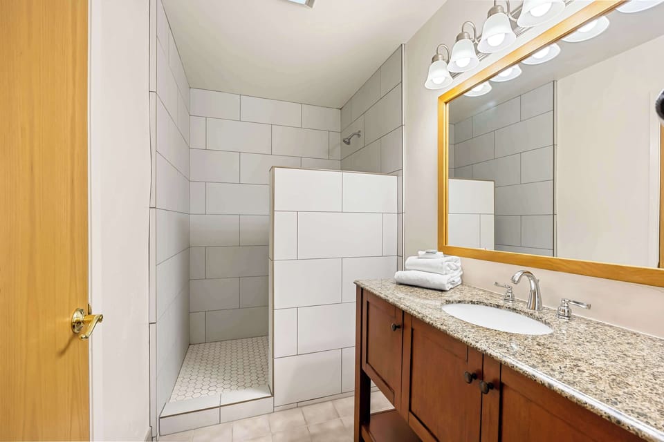 Suite, 1 King Bed, Non Smoking, Balcony (Walk-in Shower;with Sofabed) | Bathroom | Combined shower/tub, free toiletries, hair dryer, towels