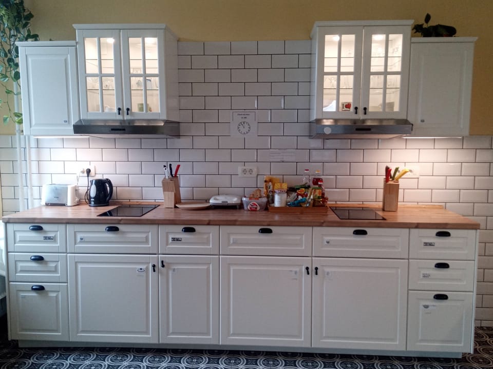 Full-size fridge, microwave, stovetop, electric kettle