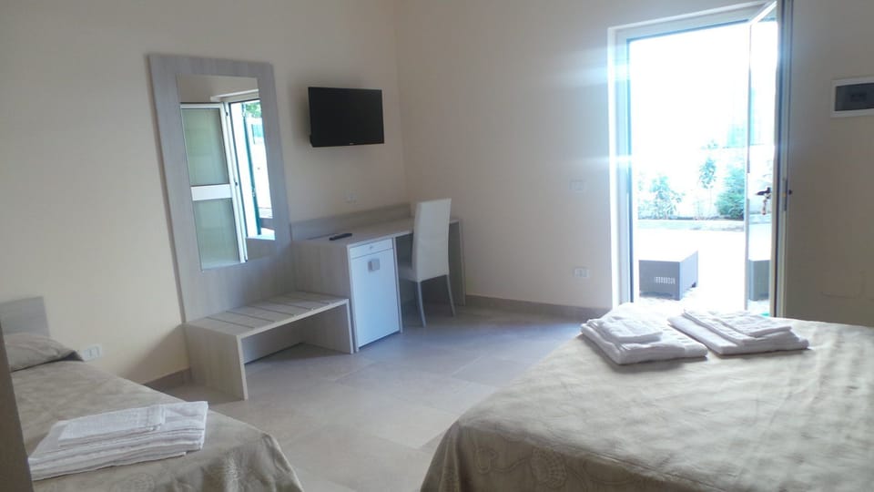 Triple Room | In-room safe, desk, blackout drapes, free cribs/infant beds