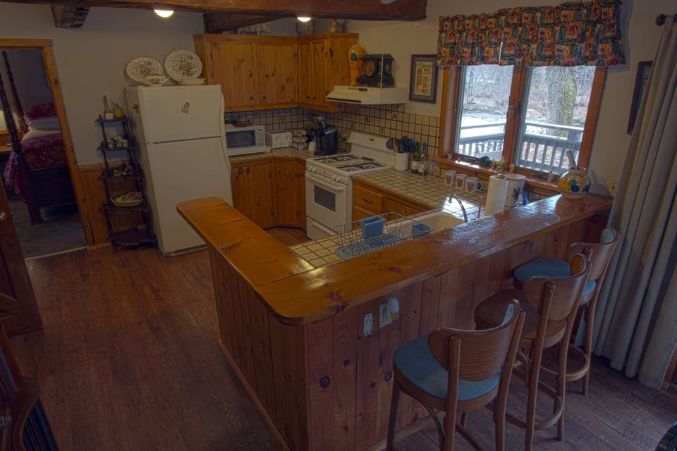 Exclusive Suite, Multiple Beds, Balcony, River View | Private kitchen | Highchair
