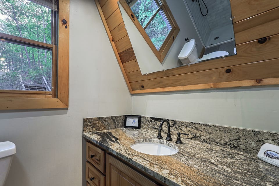 A spacious vanity and beautiful countertop give you plenty of room to refresh and get ready for the day.