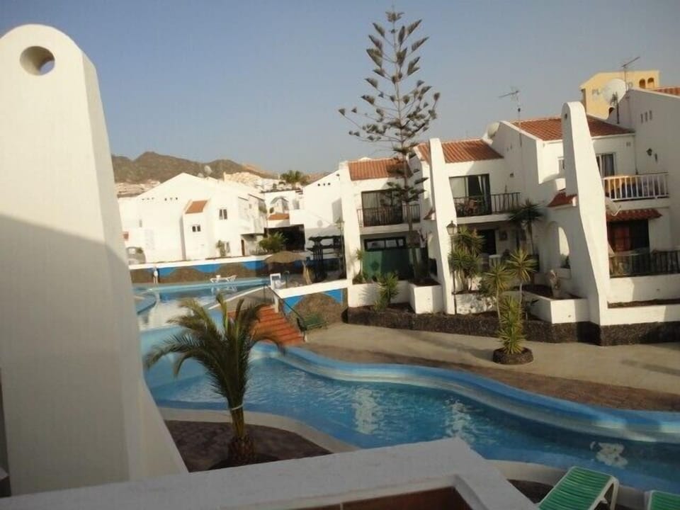 outside, river-like pool view
