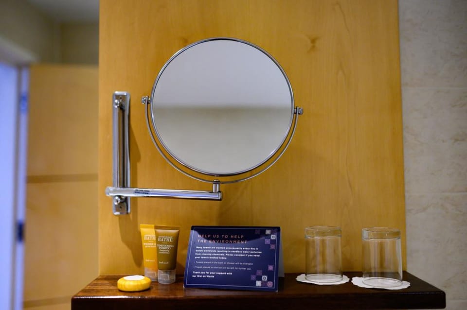 Combined shower/tub, deep soaking tub, free toiletries, hair dryer