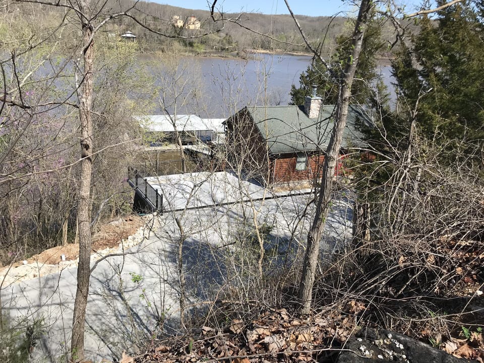 New concrete driveway and parking area 
