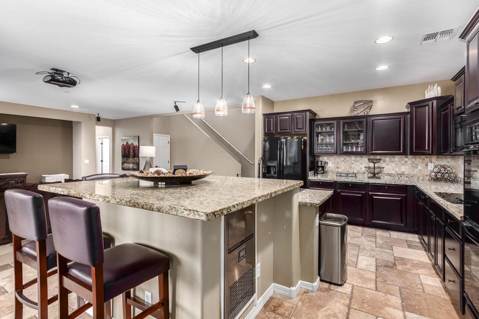 Kitchen with under counter ice machine produces 40 pounds of ice. 