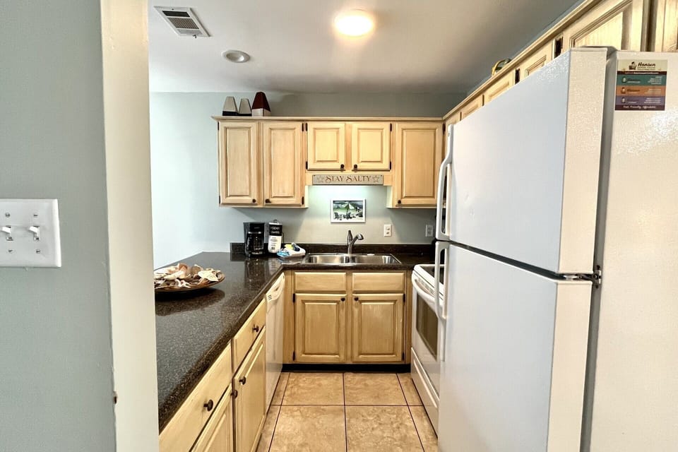 Well-appointed kitchen with all the essentials.  Plenty of counter space for prepping meals at home.
