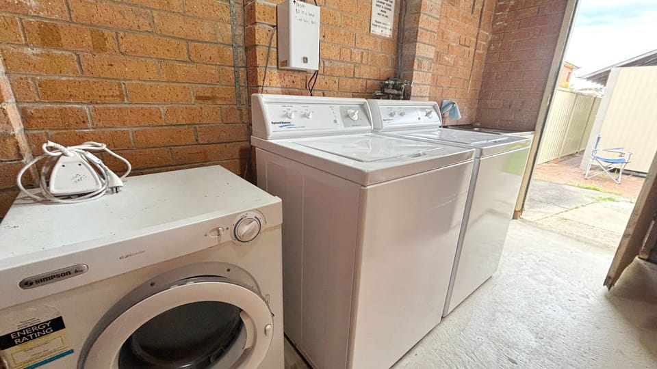 Outdoor shared laundry. 