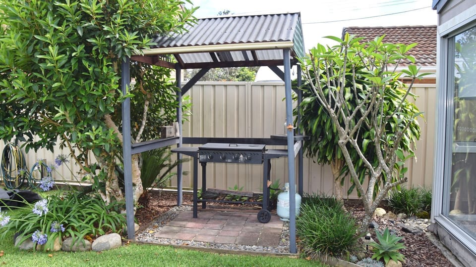 Covered BBQ area.