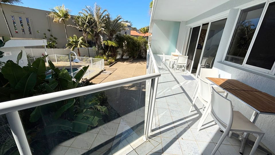 Balcony overlooking the pool.