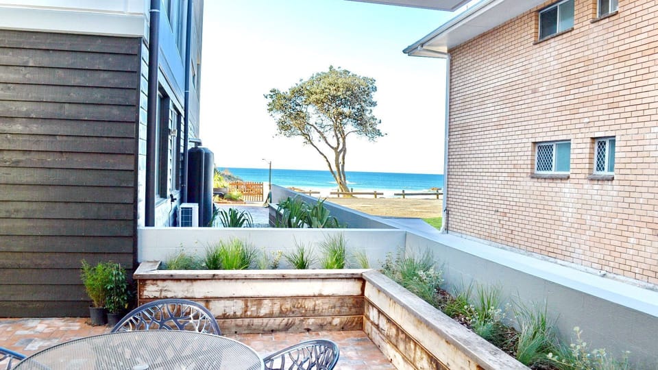 Patio with outdoor dining area.