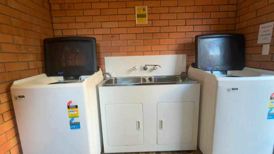 Shared outdoor laundry. 