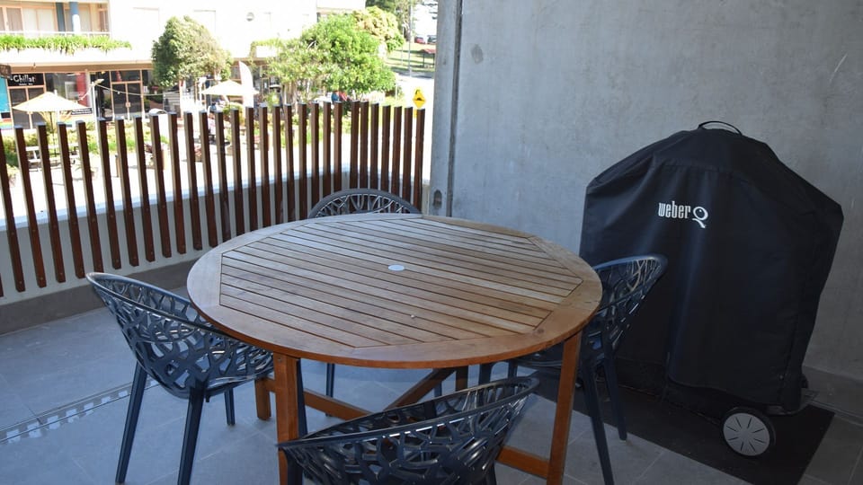 Outdoor dining and BBQ area.