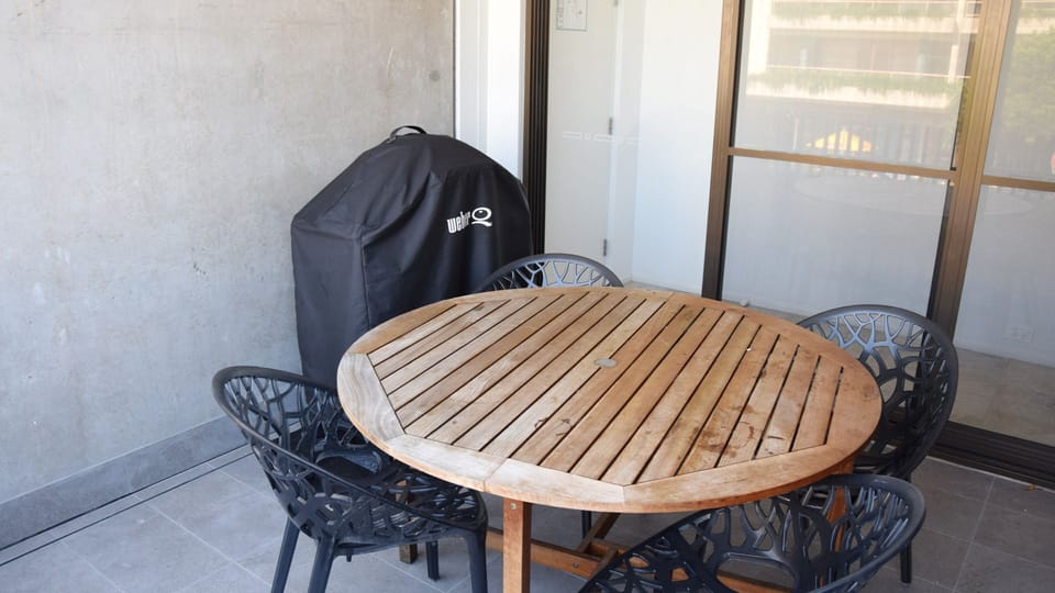 Outdoor dining and BBQ area.