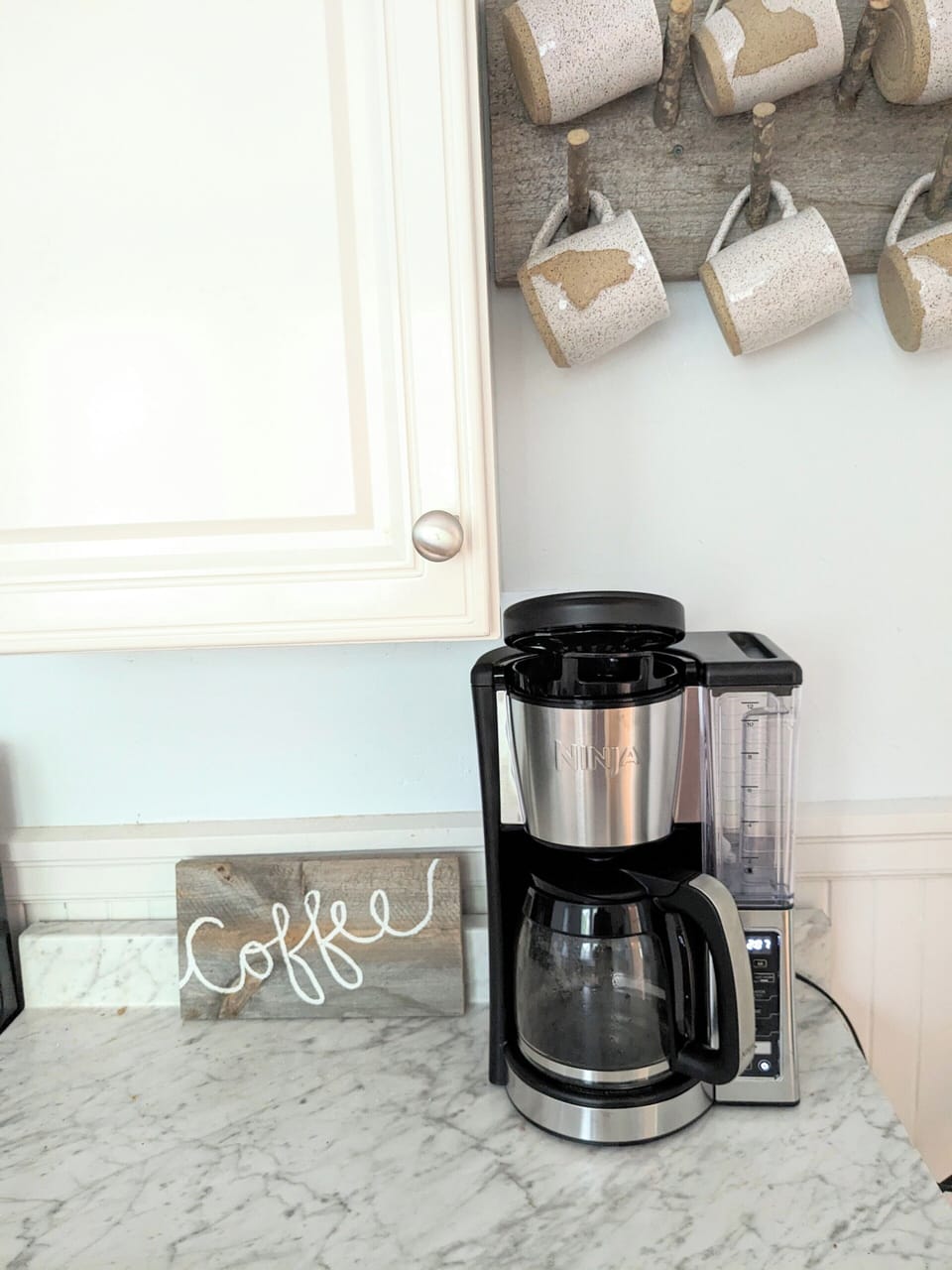 coffee station with handmade mugs