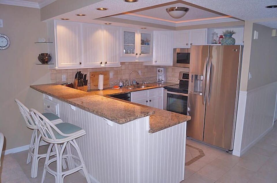 Condo, 2 Bedrooms | Private kitchen | Fridge, microwave, dishwasher, coffee/tea maker