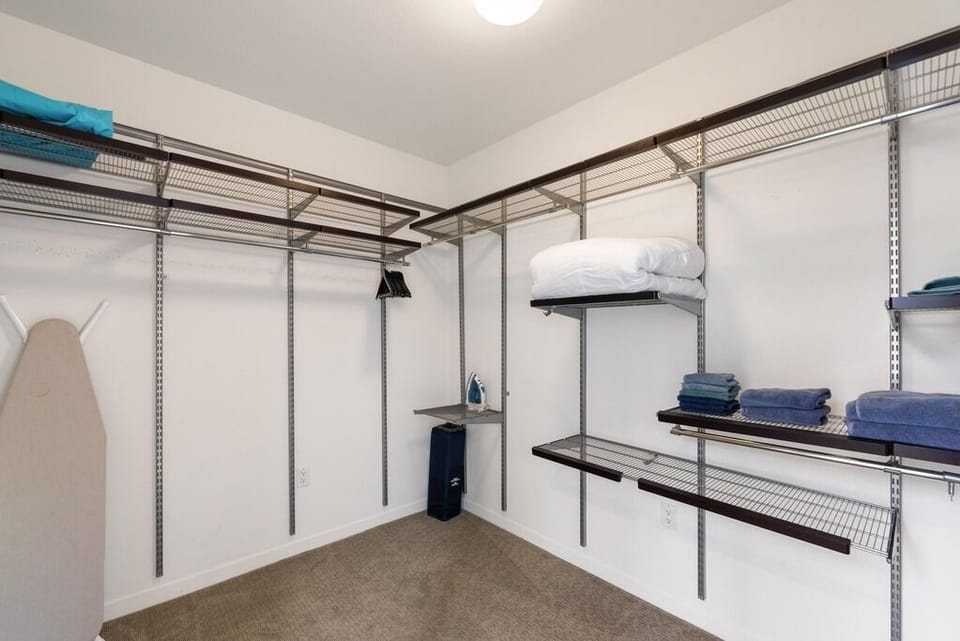 Spacious, open closet system for easy organization of your wardrobe.
