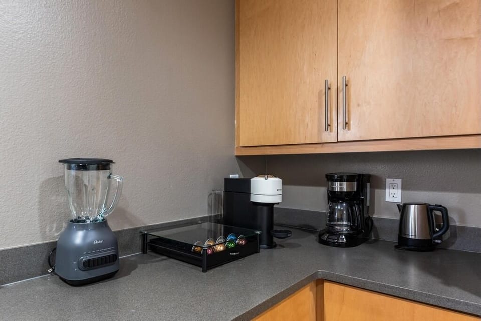 Start your day right with the included coffee maker and essentials.