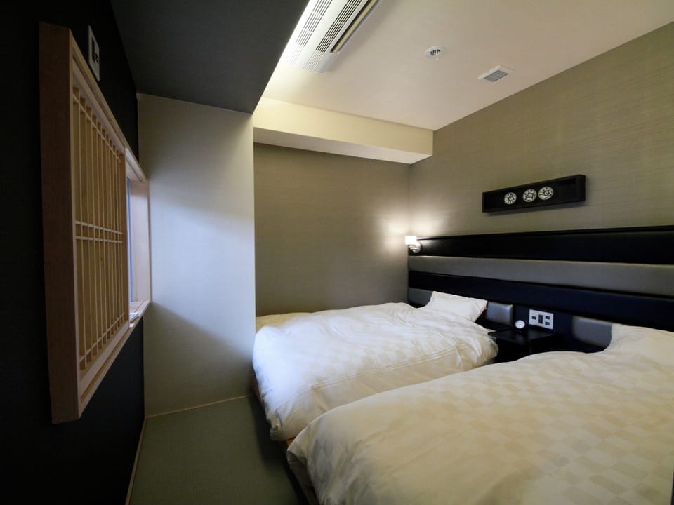 In-room safe, desk, iron/ironing board, WiFi (free)