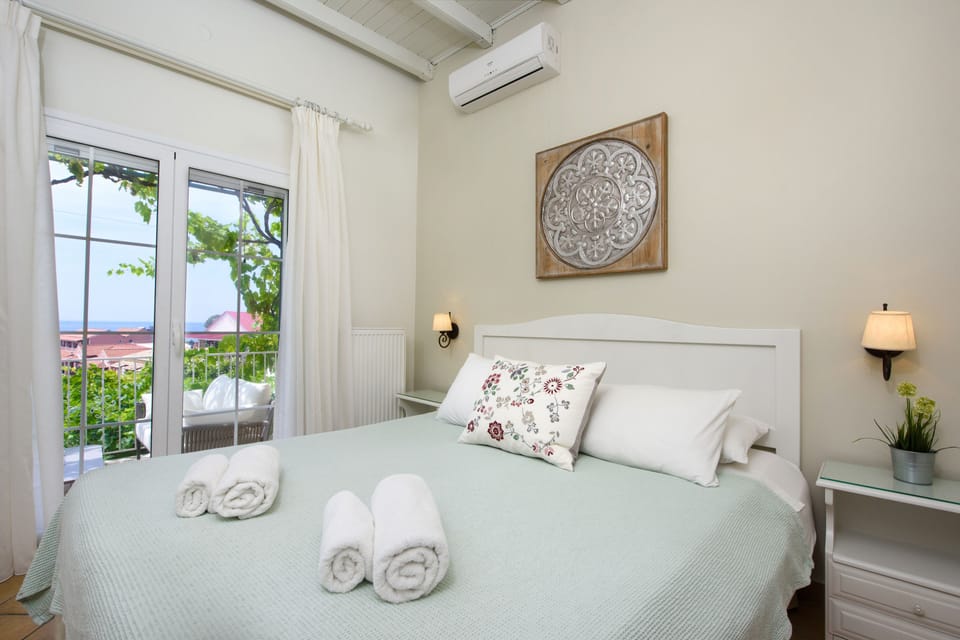 Exclusive Apartment, 2 Bedrooms, Balcony, Sea View | In-room safe, individually furnished, desk, iron/ironing board