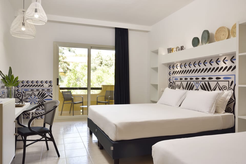 Family Room, Balcony (Deluxe) | Minibar, in-room safe, desk, free WiFi