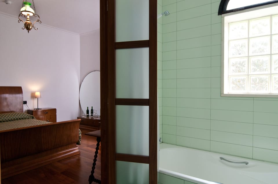 Superior Double Room | Bathroom | Free toiletries, hair dryer, bathrobes, slippers