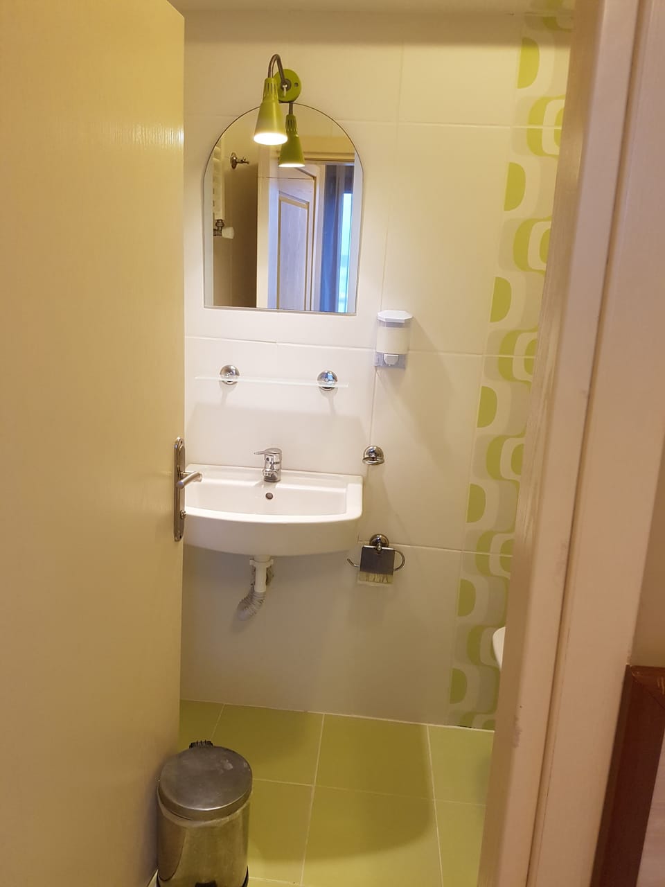 Shower, hair dryer, slippers, towels