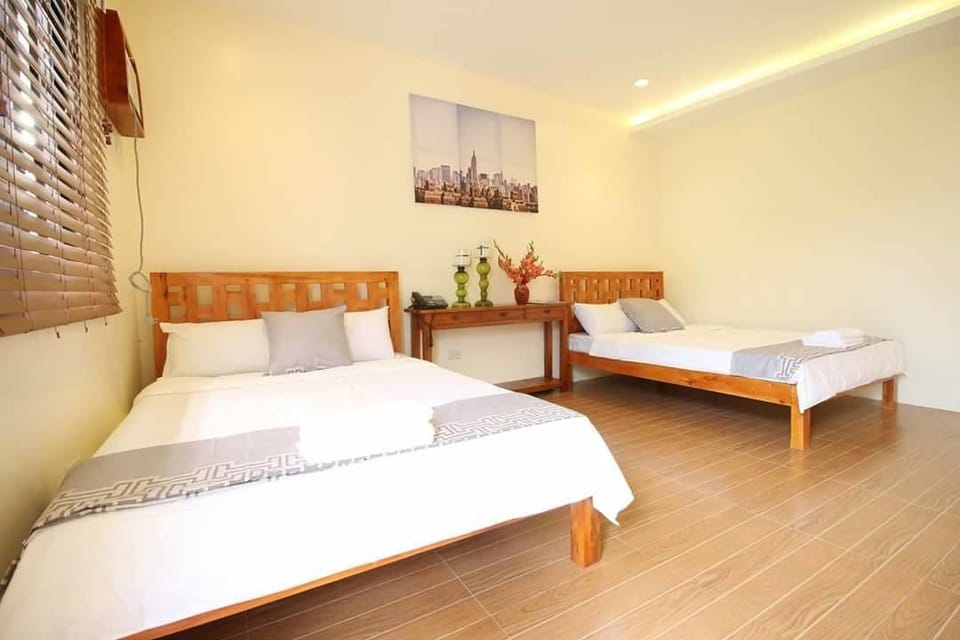 Ilang-ilang | Premium bedding, desk, laptop workspace, soundproofing