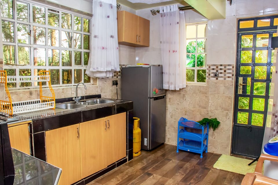 Family House, 3 Bedrooms | Private kitchen | Fridge, microwave, stovetop, coffee/tea maker