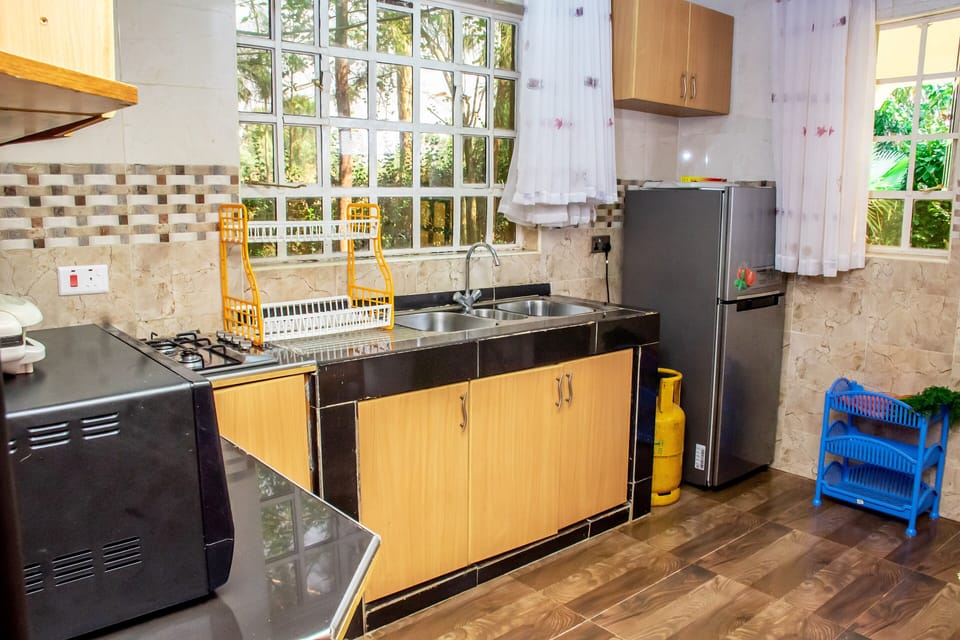Family House, 3 Bedrooms | Private kitchen | Fridge, microwave, stovetop, coffee/tea maker