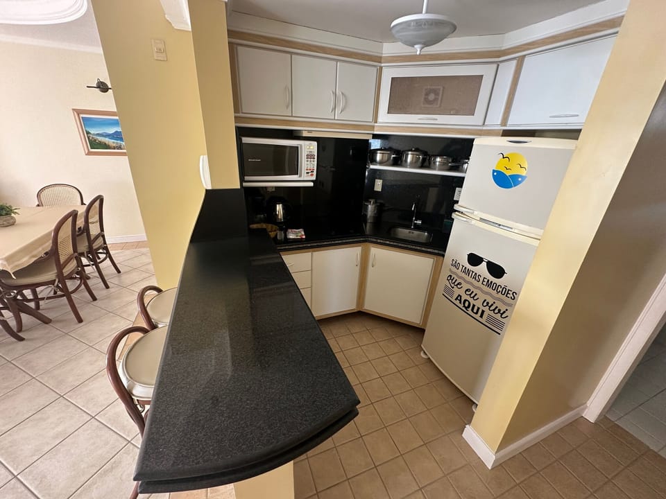 Standard Apartment, 2 Bedrooms | Private kitchen | Microwave, stovetop, cookware/dishes/utensils