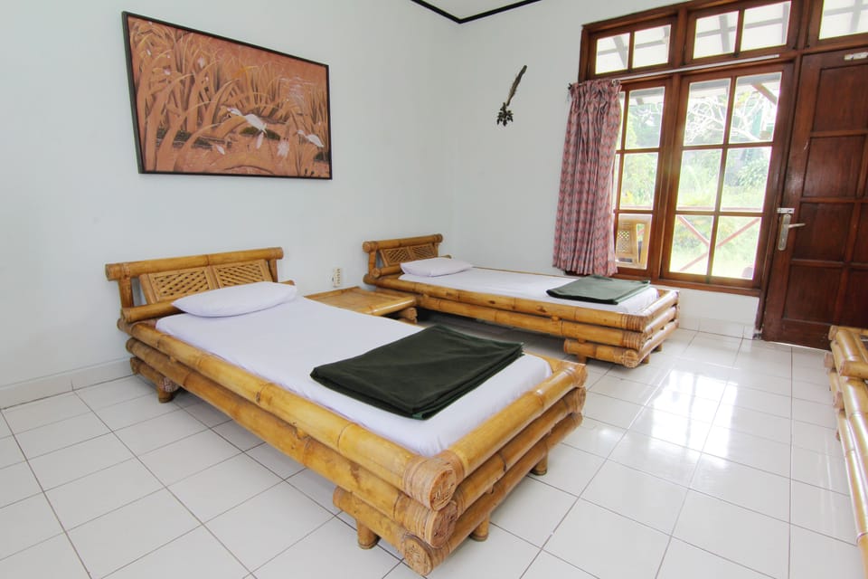 Standard Room, Private Bathroom | In-room safe, bed sheets