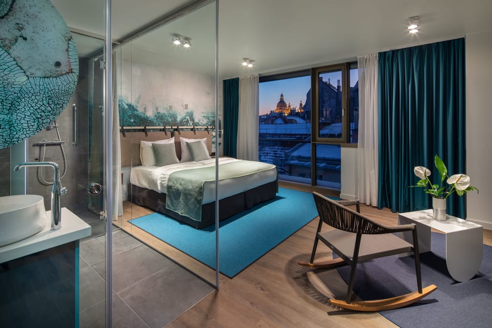 Deluxe Room | Memory foam beds, minibar, in-room safe, individually decorated