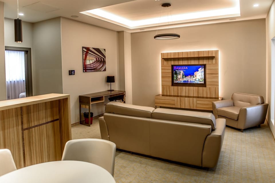 Suite, 1 King Bed, Non Smoking | Living area | 40-inch LCD TV with cable channels, TV