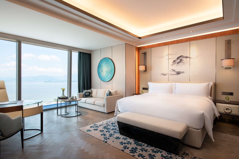 Premium bedding, down comforters, pillowtop beds, minibar