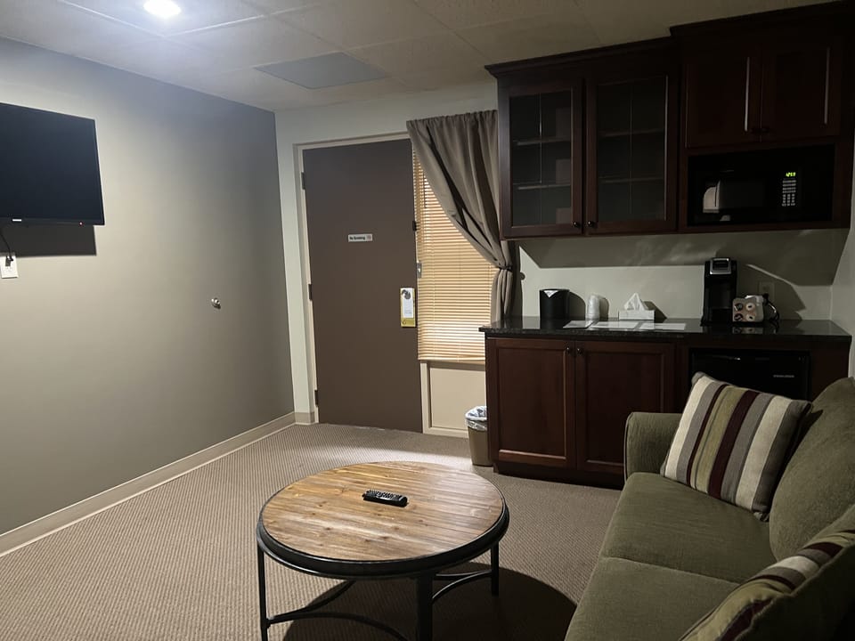 Standard Suite, 1 King Bed with Sofa bed, Non Smoking | Living area | Flat-screen TV