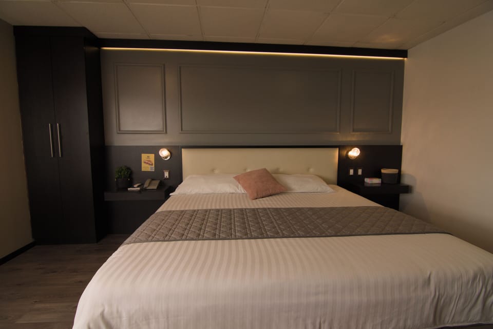 Deluxe Room, Non Smoking, City View | Premium bedding, desk, laptop workspace, blackout drapes