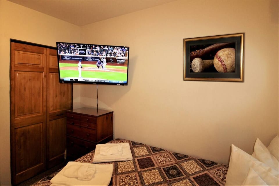 Bedroom #2 with 43" (or larger) flat screen smart Roku TV to watch all your favorite teams or shows from the comfort of your air-conditioned bedroom
