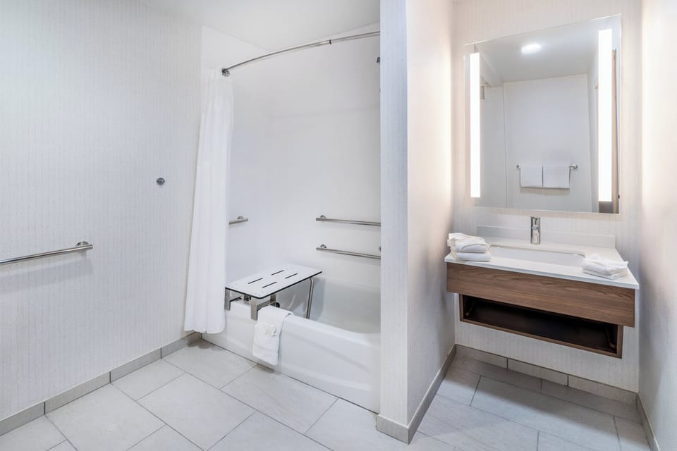 Hypo-allergenic bedding, down comforters, desk, laptop workspace