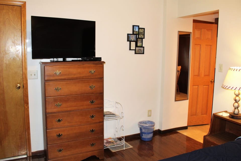 Bedroom/Living Area combo with 50" or larger Roku Smart TV