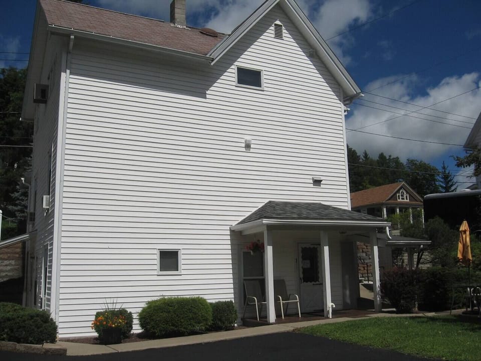 Private, off street parking, with a covered porch to enjoy your morning coffee! 