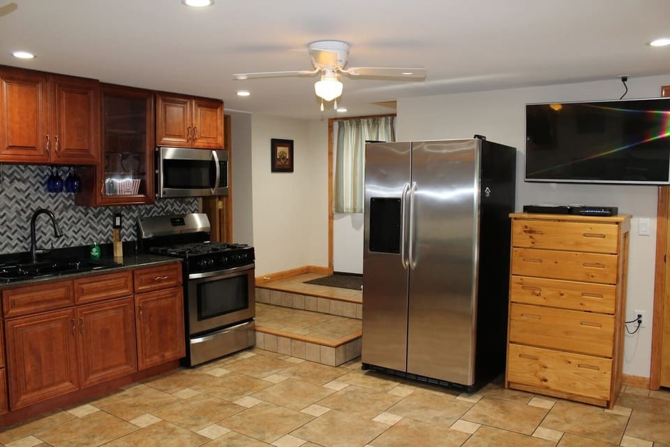 Lower level wet bar/ kitchenette.  Flat screen TV in every bedroom