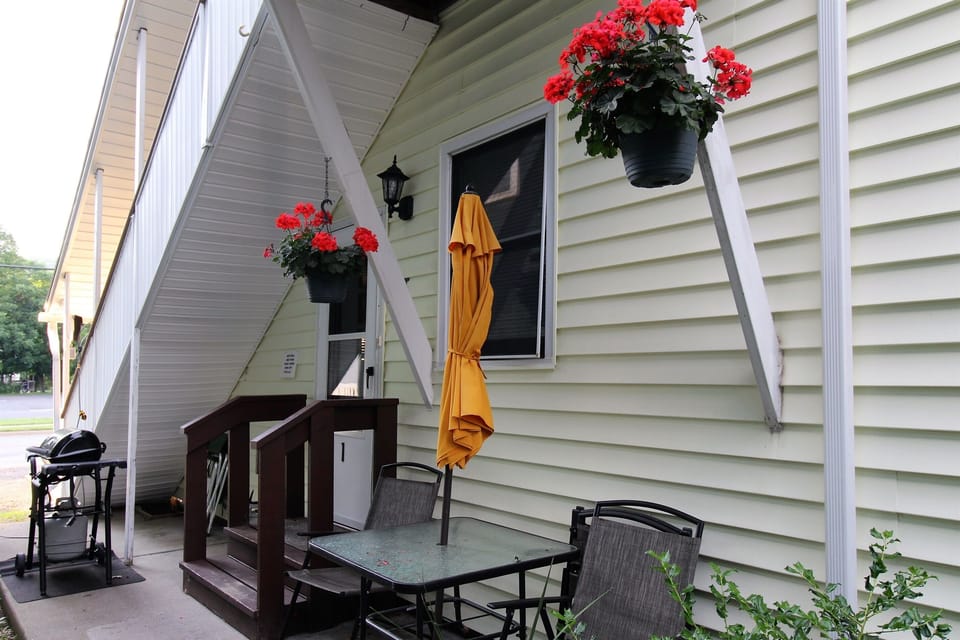 Cozy private patio area with gas grill