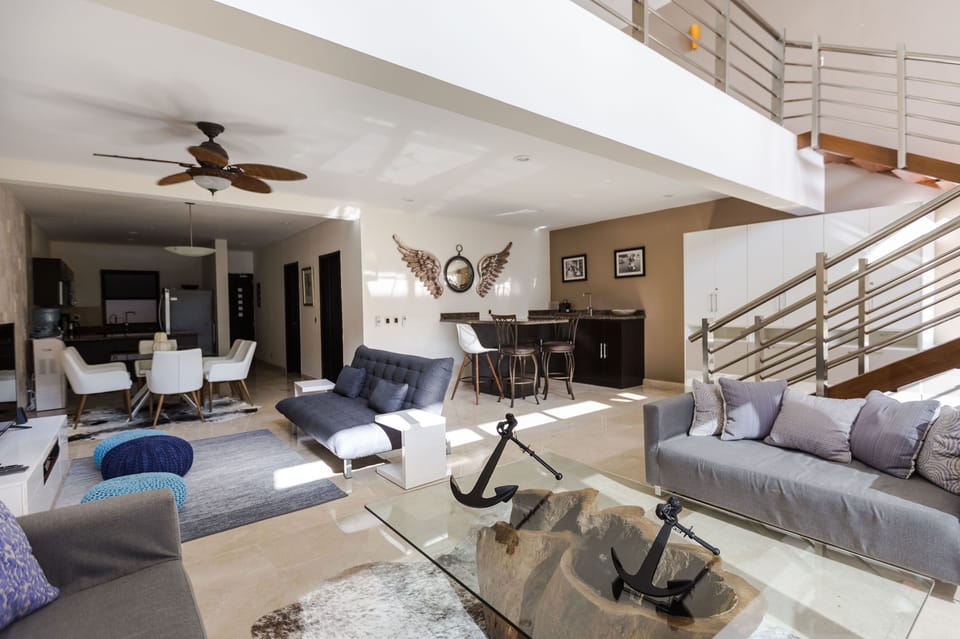 Deluxe Apartment | Living room | Flat-screen TV
