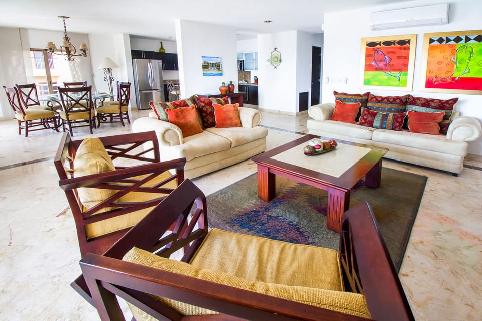 Deluxe Apartment | Living room | Flat-screen TV