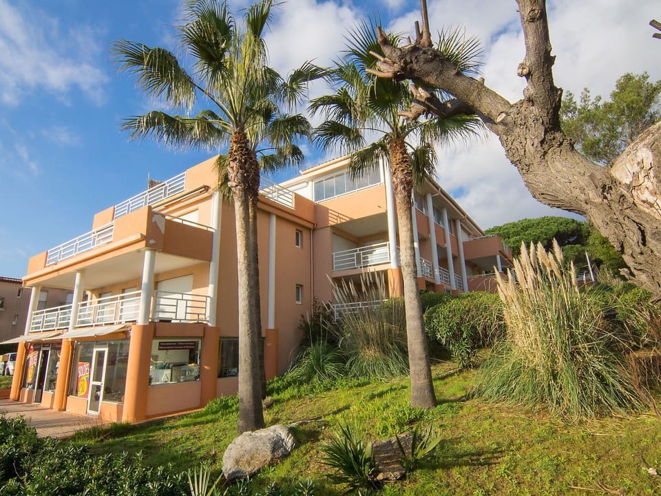 Cloud, Sky, Plant, Building, Property, Window, Tree, Land Lot, Arecales, Vegetation