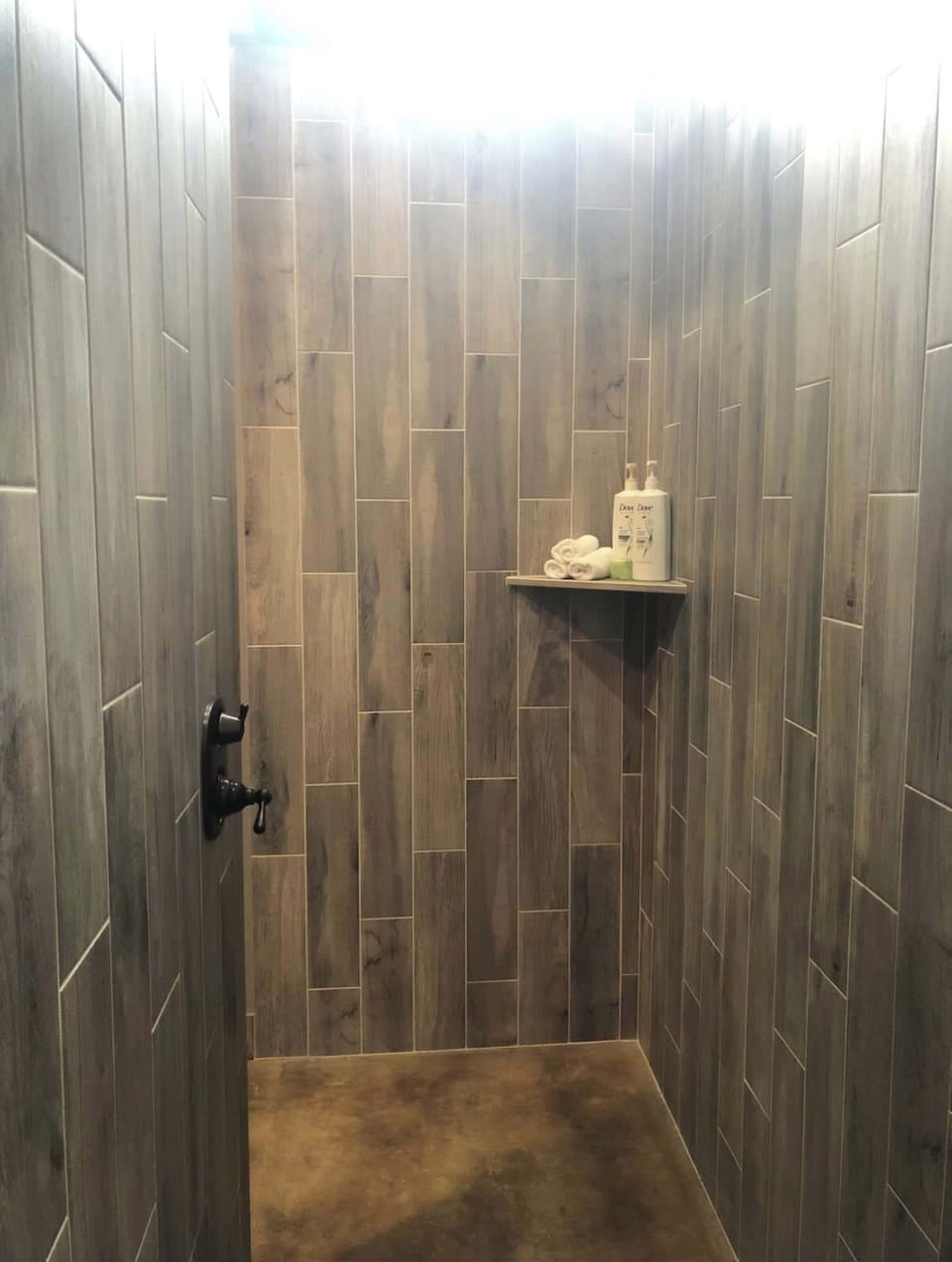 Large walk in tile shower with dual rain fall shower heads